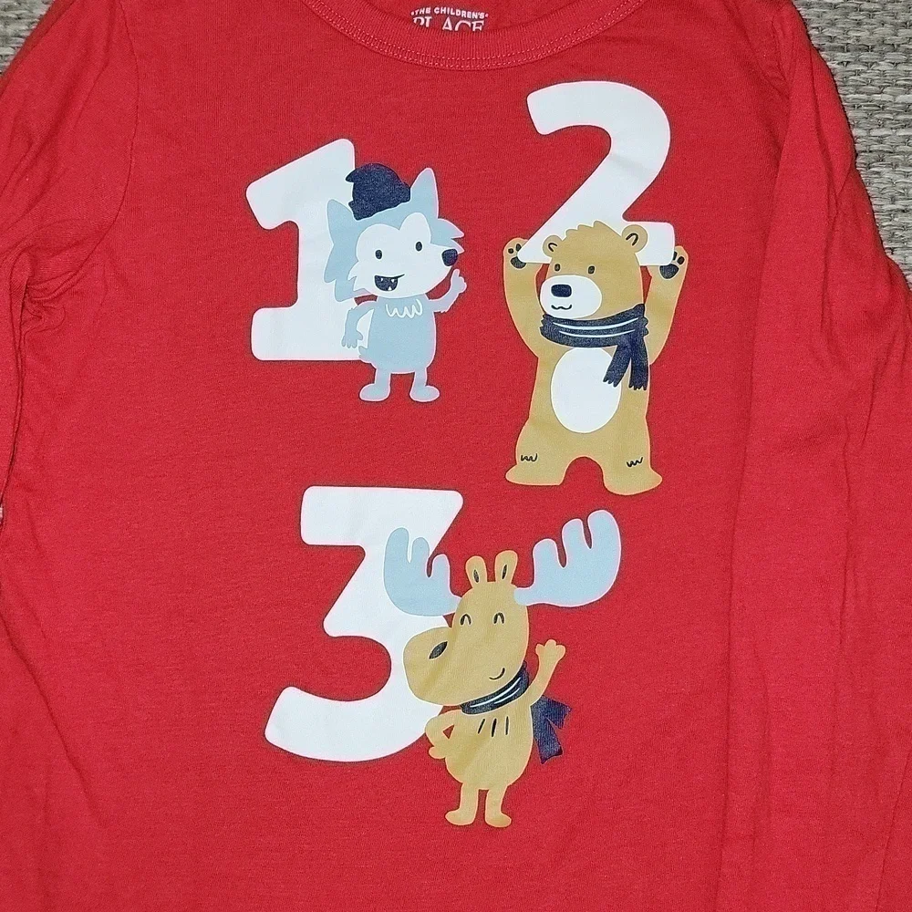 The children’s place size 5T long sleeve graphic shirt red animal graphics